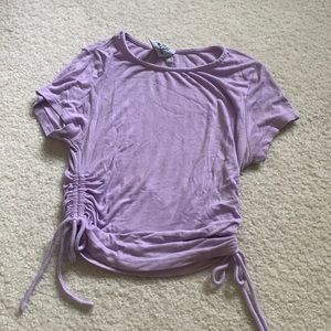 Lavender short sleeve with ruched sides.